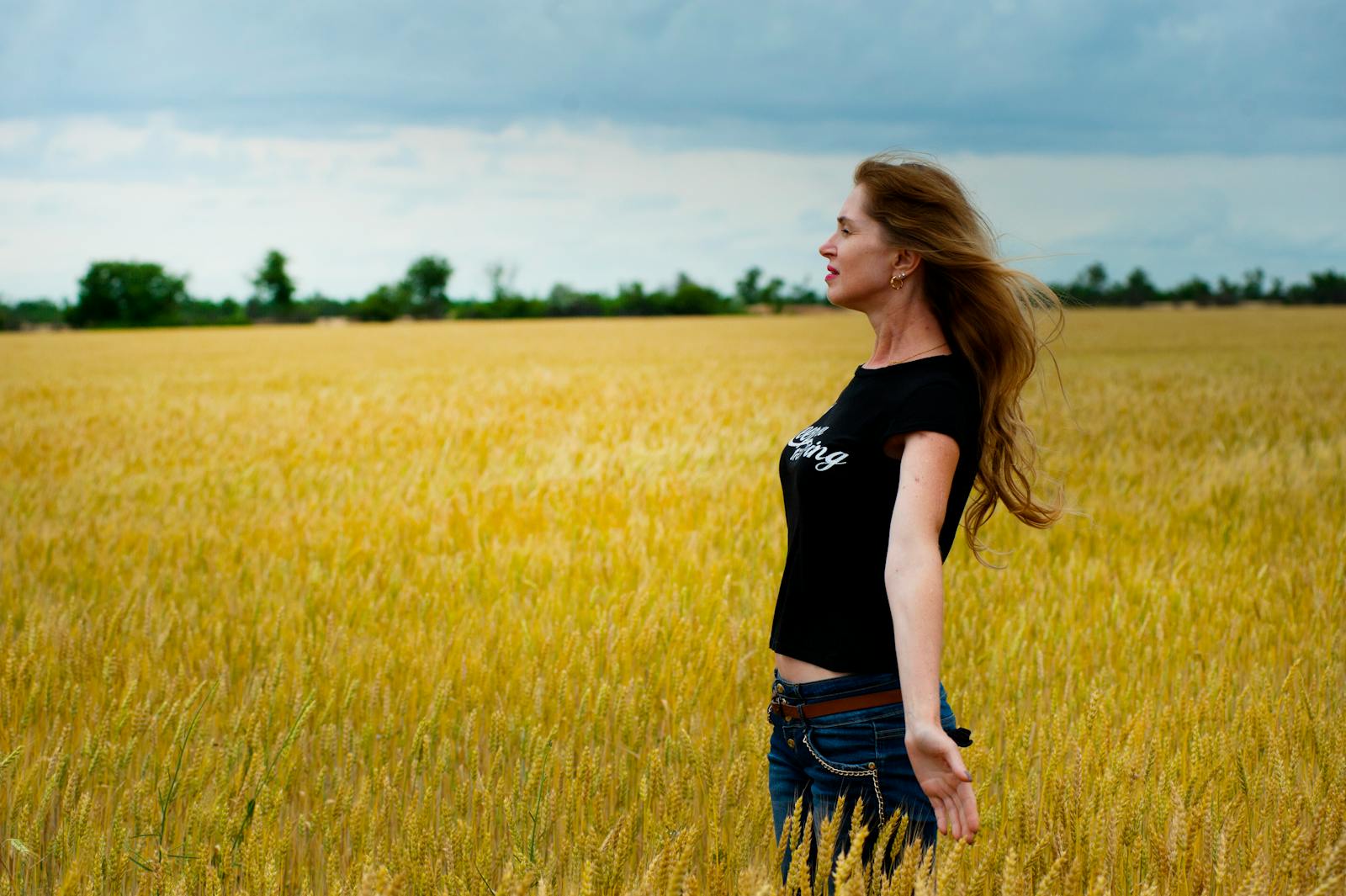 Woman Wearing Black Shirt Surrounded by Grass, life